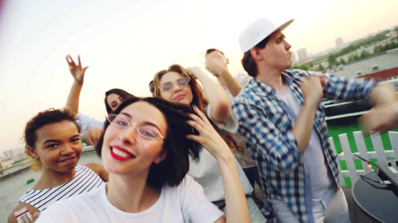 Friends Having Fun on a Rooftop Party