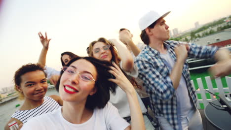 friends having fun on a rooftop party