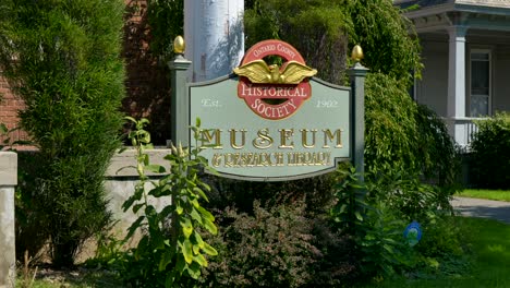 sign on the front of the historical museum and research library for the ontario county research society in canandaigua new york