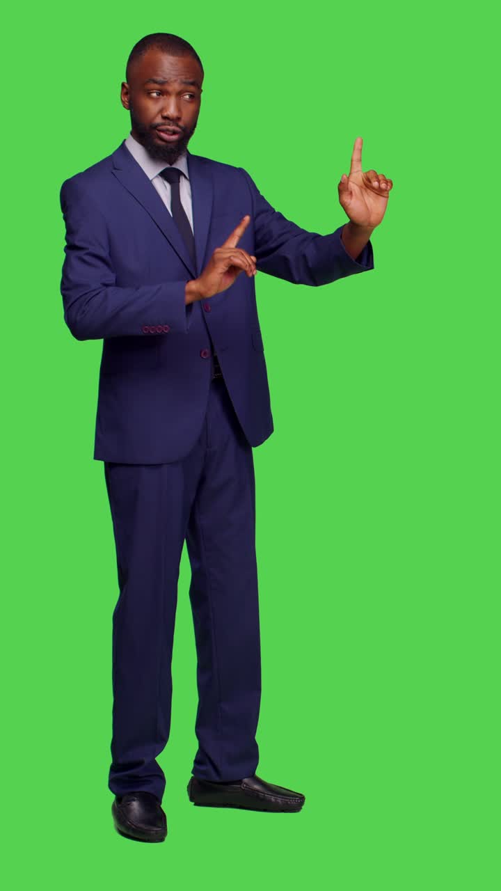 Vertical video: Side view of negative businessman doing stop sign with palm raised