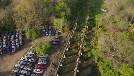 wrecked cars left to decay in a remote junkyard