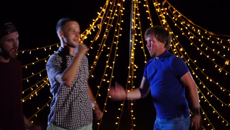 friends dancing at night party