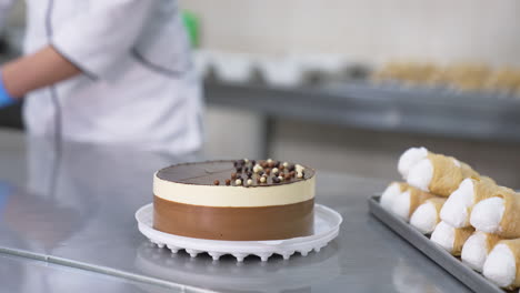 chef preparing chocolate mousse cakes and cannoli