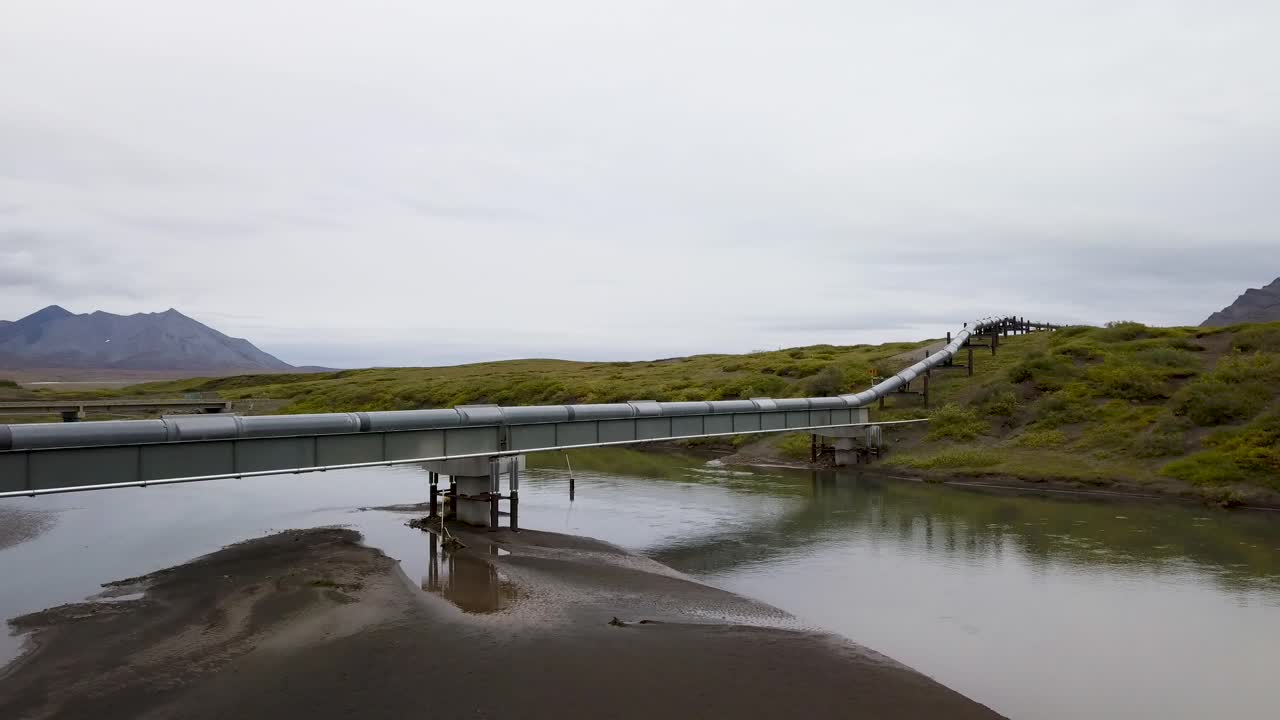 Alaska Pipeline Transporting Barrels of Crude Oil in North America - Aerial Drone