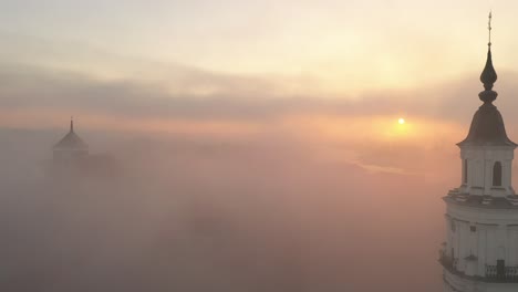 drone aerial view of foggy morning in kaunas old town