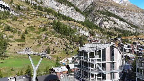 stunning aerial view of a modern alpine village in the swiss alps
