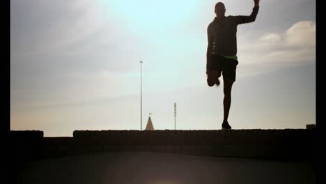 african american man exercising on beach in the sunshine 4k