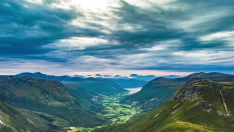 dark stormy clouds passing over the narrow valley