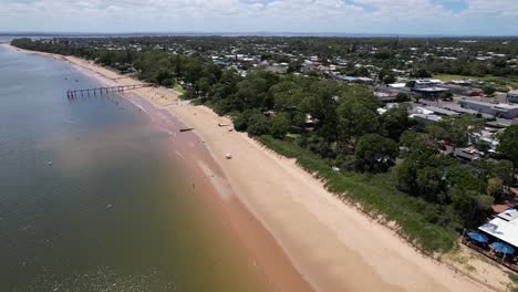 aerial drone footage of torquay beach jetty in hervey bay, queensland