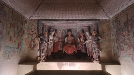 statues of buddha in the mogao grottoes of dunhuang, gansu, china dunhuang