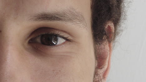 close-up-of-mixed-race-man-eyes-looking-happy-contemplative-reflection-vision-eyesight