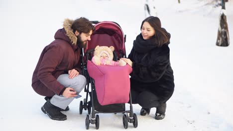 family portrait with baby in winter