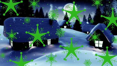 Green-stars-and-snowflakes-icons-over-snow-falling-over-winter-landscape-against-moon-in-night-sky