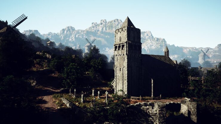 Middelalderlandsby med kirke og vindmøller i bjergene