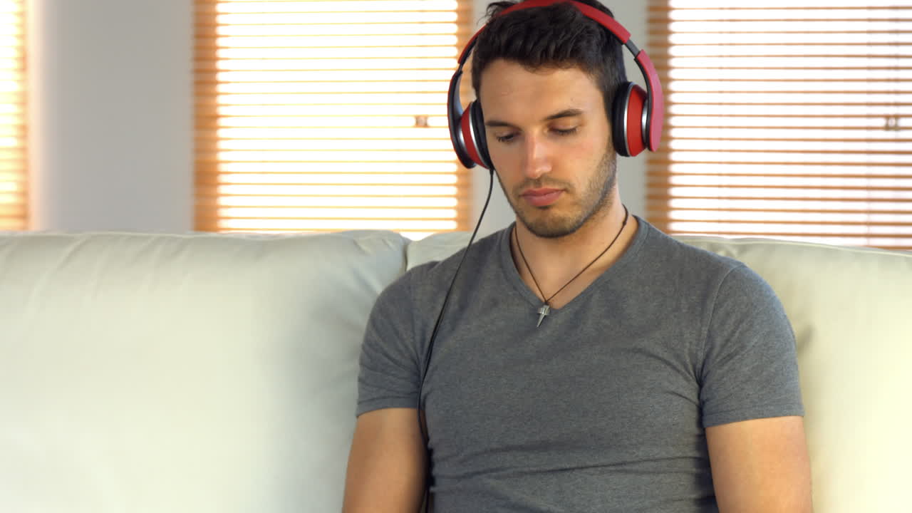 Man listening to music on his phone