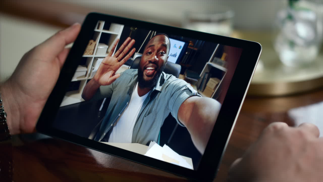 Man on Tablet Video Call