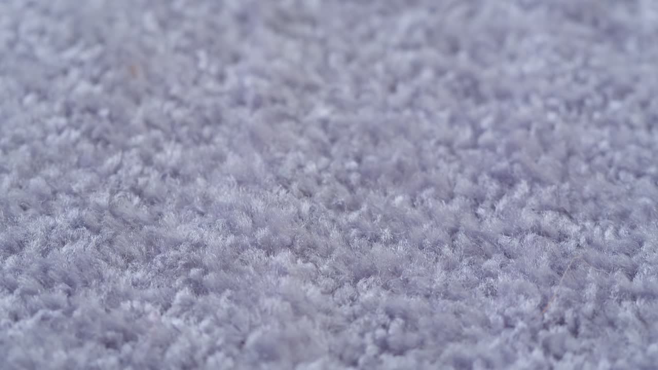 Macro View of Soft Purple Carpet Texture