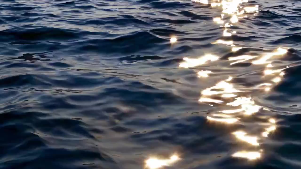 Sunlight Reflecting on Gentle Ocean Waves