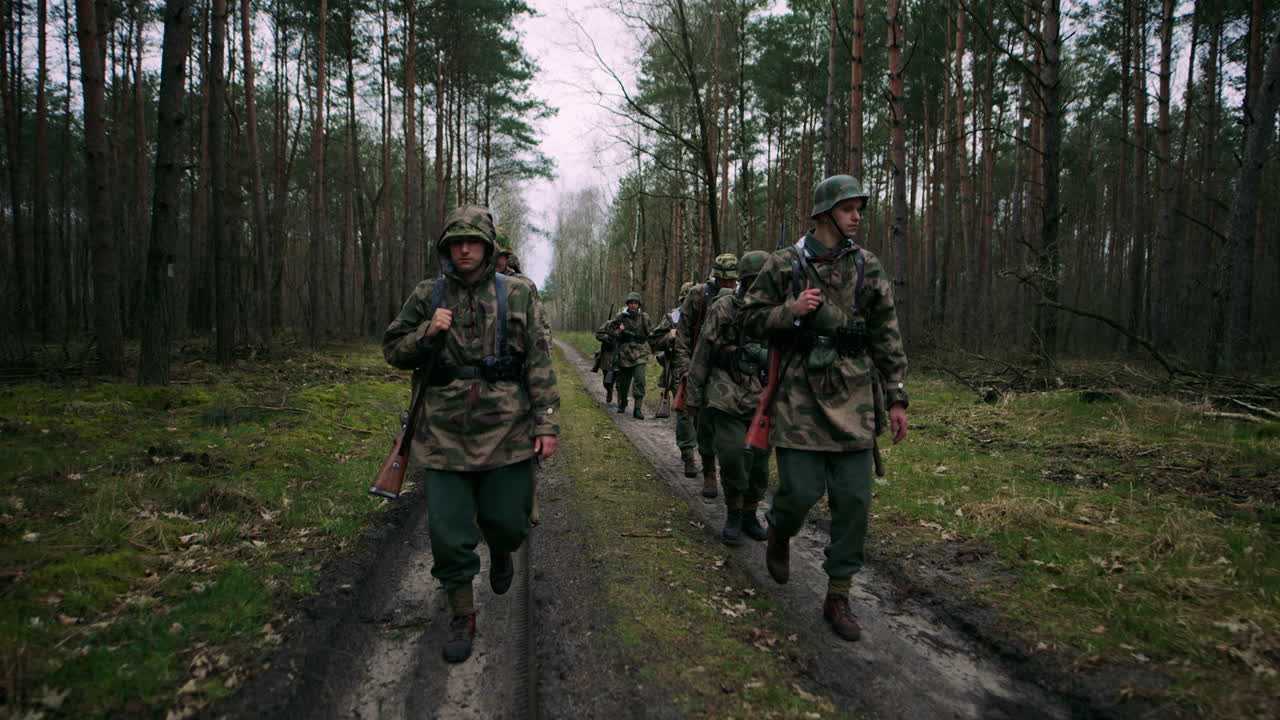 WWII Soldiers Marching Through Forest