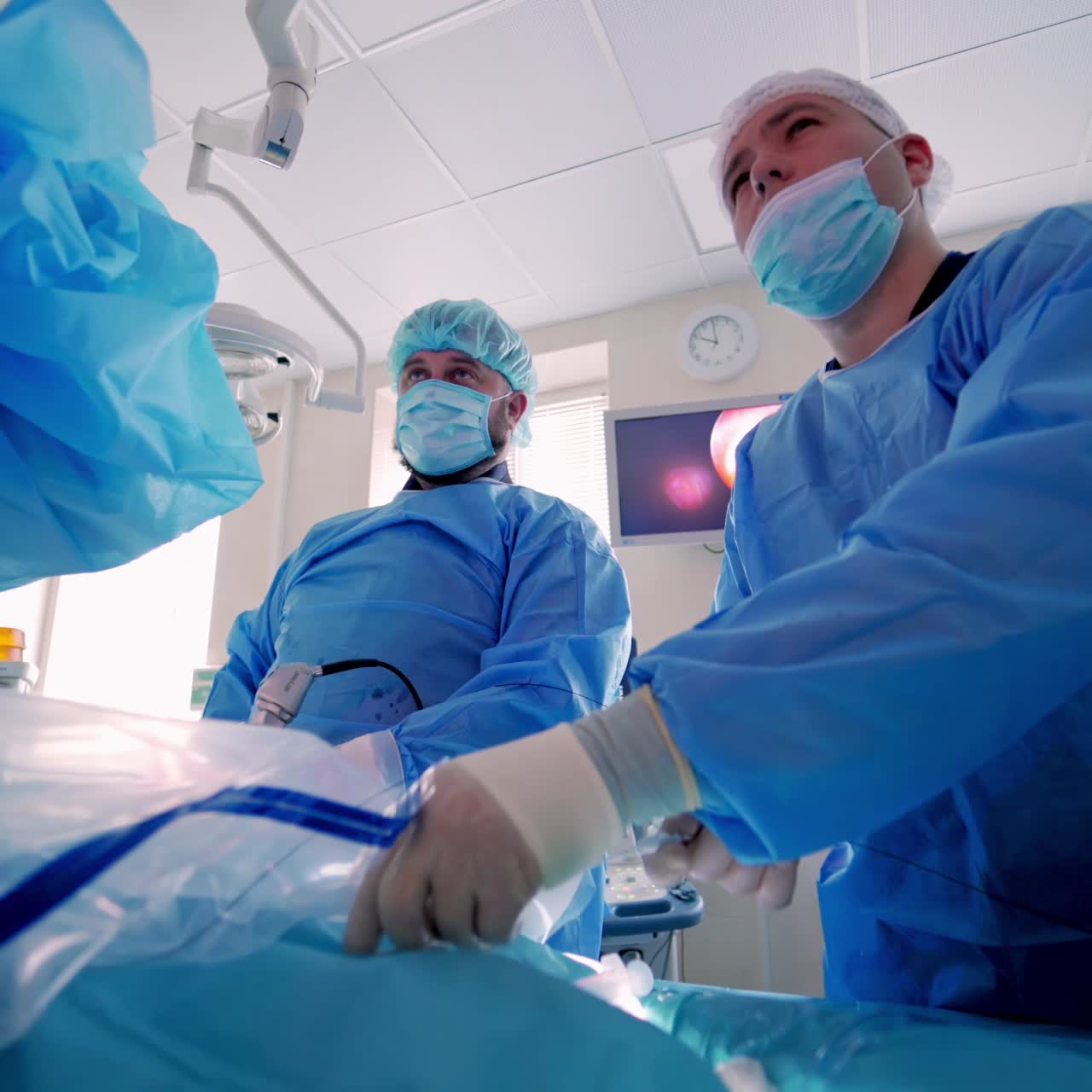 Team surgeon at work in operating room