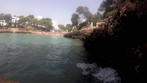 Spain,-Mallorca,-Cala-D'or-beach-from-above-and-bellow-with-a-drone-DJI-Mavic-Air-and-a-YI-4k+-at-4k-60fps-and-24fps-using-ND-filters-and-stabilised