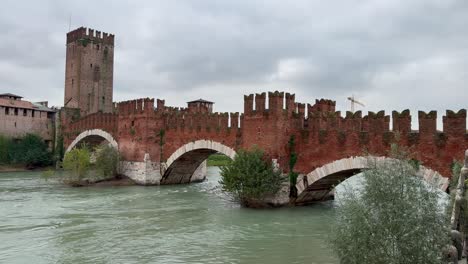 Landscape of Verona city with Adige river and Ponte di Castelvecchio fortified bridge and castle