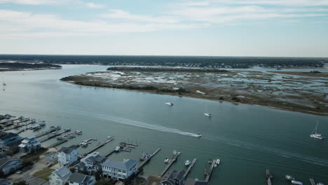 panning aerial shot over wrightsville beach, north carolina shoreline beautiful scenic view