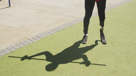 Low-angle-view-man-with-prosthetic-leg-exercising