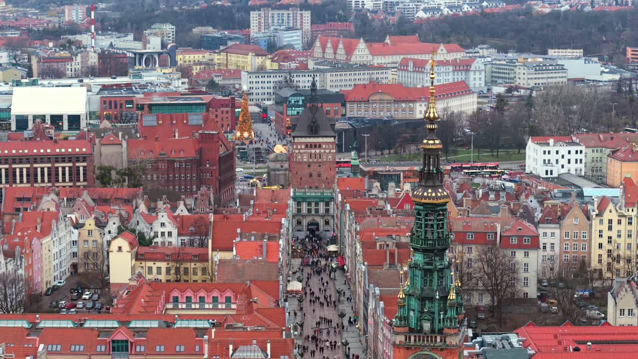 Gdansk's old town with red rooftops and the iconic main town hall tower, aerial view
