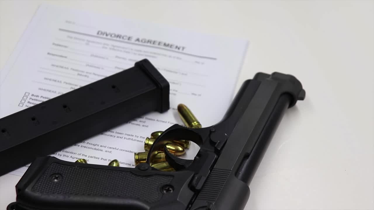 Divorce Agreement and Gun: A Representation of Conflict