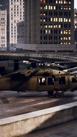 military helicopter landing on city expressway