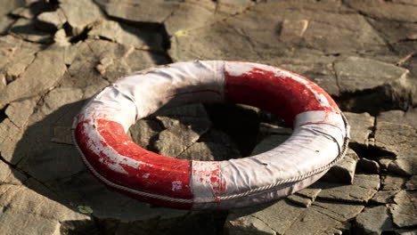 very old abandoned grungy lifebuoy