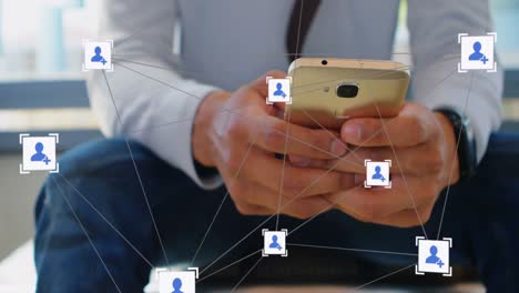 Animation-of-network-of-profile-icons-over-mid-section-of-caucasian-man-using-smartphone-at-office