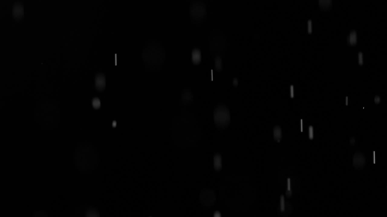 Real rain natural drops falling or snow 4K alpha channel footage. Heavy rainfall, shower, snowfall
