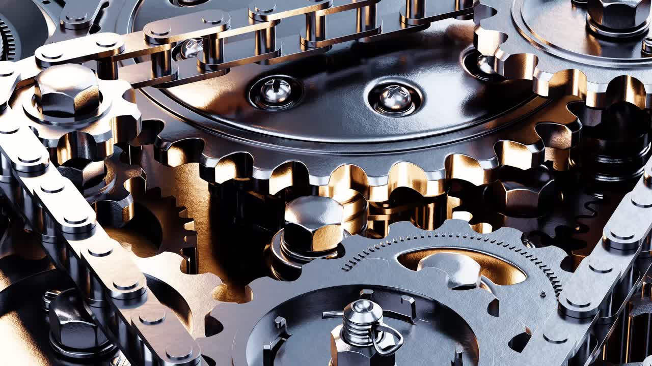 Close-up of Interlocking Metal Gears and Chains Rotating