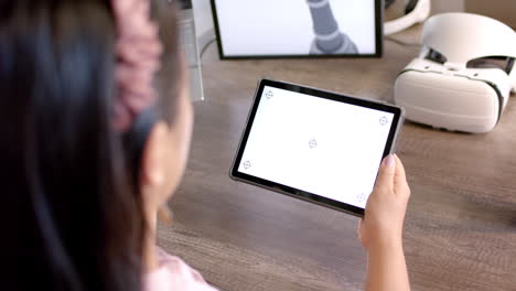 holding tablet, woman interacting with robotic interface in modern office, copy space