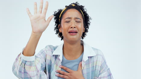 Praying,-woman-and-hand-on-chest-on-studio