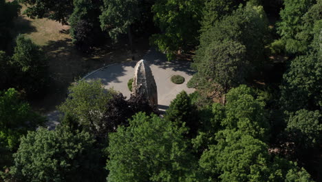 Close-orbiting-aerial-shot-of-gothic-tower---Landmark-in-Sad-Janka-Krala,-Bratislava,-capital-of-Slovakia---summer-sunny-day