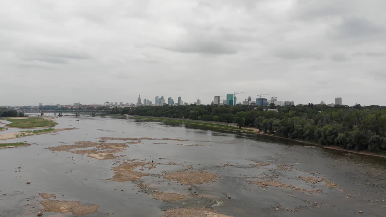 Shoal on the river overlooking the skyscrapers