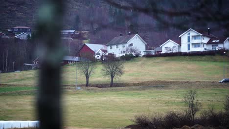 Cars-passing-by-out-in-the-country-land