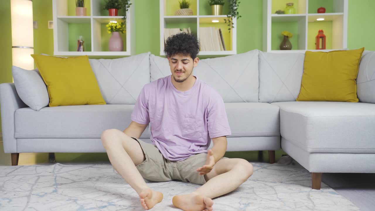 Funny young man can't do exercise moves.