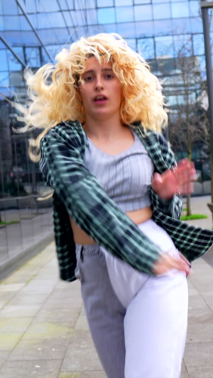 Woman with Curly Hair in City