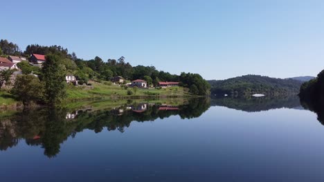 aerial drone above river lake at fornelos de montes, spain