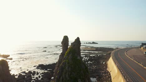 totoro iwa rock on noto peninsula, aerial view at sunset, japan