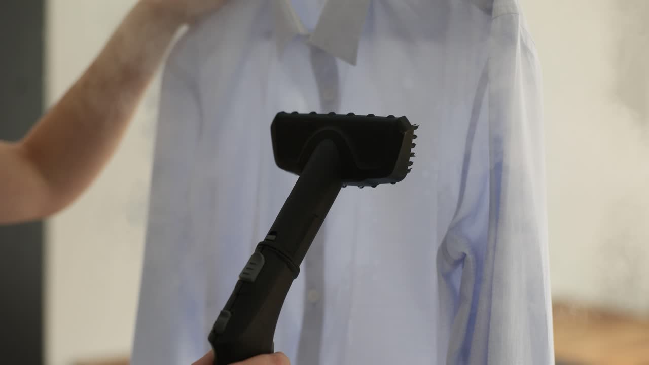 Ironing a shirt with steam