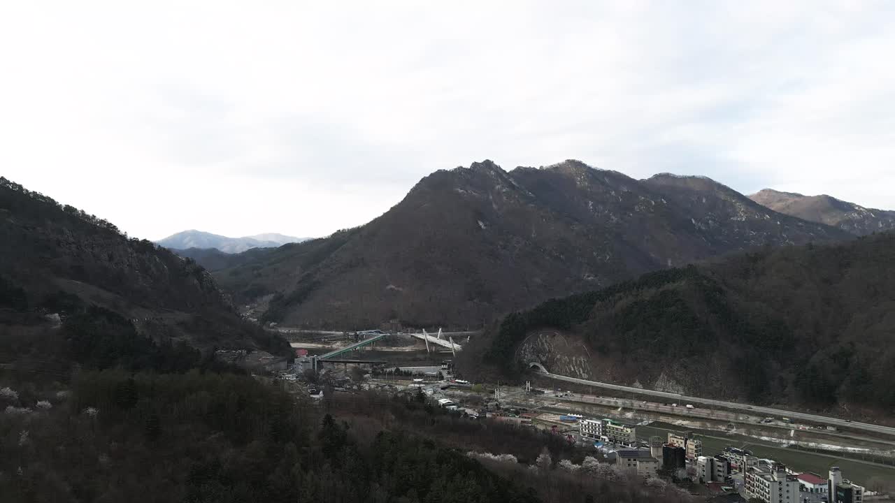 Aerial drone shot hills and mountains in Chuncheon city Gangwon province, South Korea