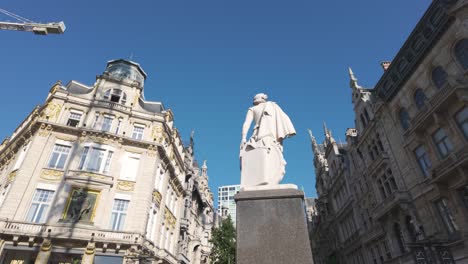 scenic view of anthony van dyck statue in antwerp, belgium, monument with historic architecture