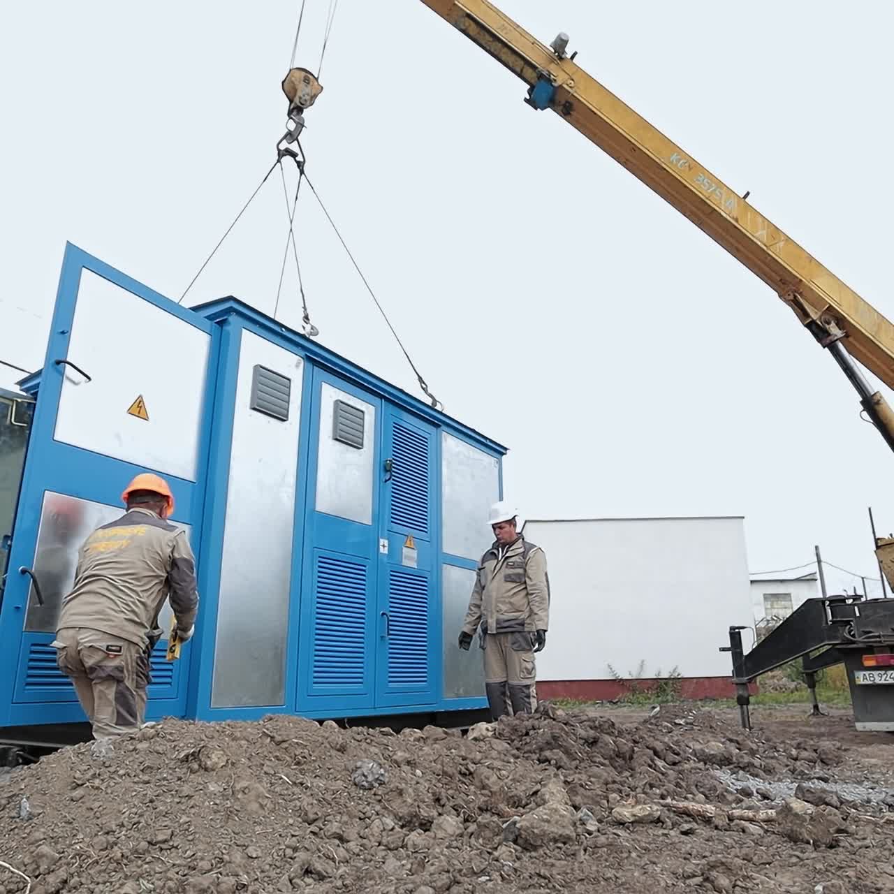 Constructive engineer installing electric supply. Engineering electricity construction