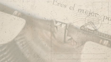 animación de una máquina de escribir antigua con una carta escrita en español sobre un sobre estampado