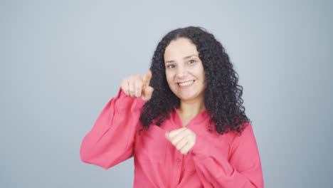 Young-woman-giving-motivational-speech-to-camera.